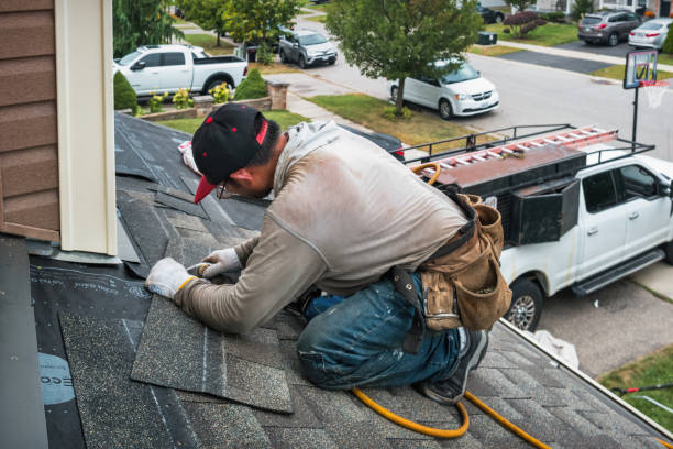 Professional Flat Roof Repair technician working in Whately, MA